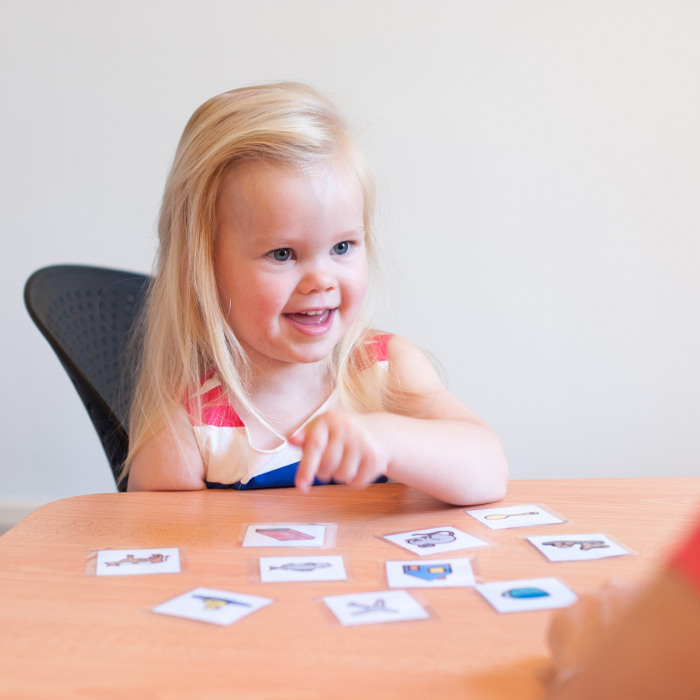 Young child having her hearing tested during the speech discrimination part of the hearing assessment in Adelaide